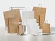 shoppe in carta kraft e maniglie intrecciate